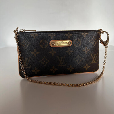 LOUIS VUITTON pochette Eva monogram. Sac de luxe de seconde main authentique Entrupy certified.