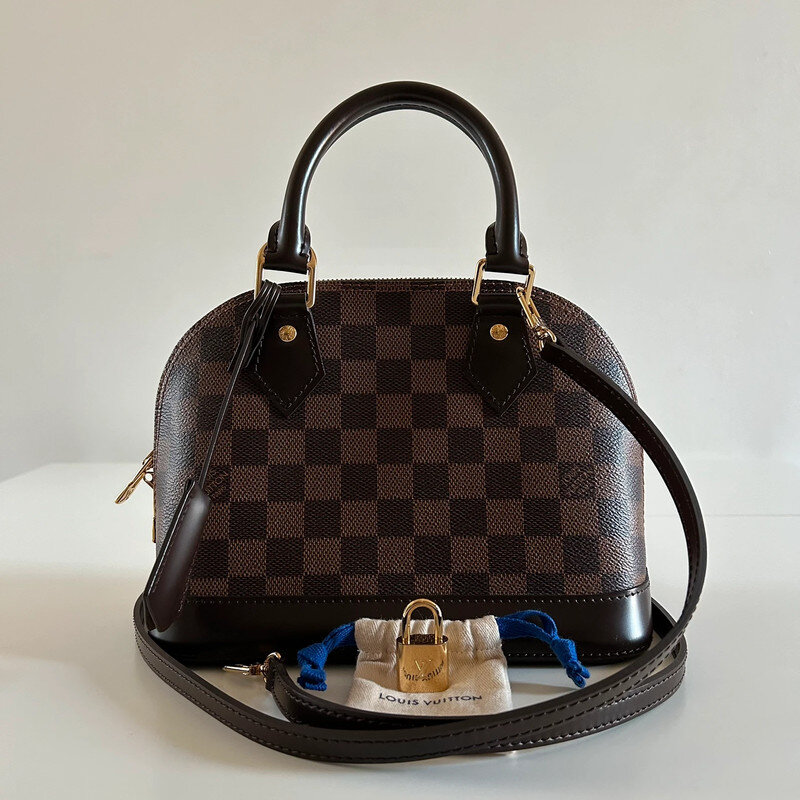 LOUIS VUITTON ALMA BB DAMIER EBENE FULL SET. AUTHENTIQUE SAC DE LUXE DE SECONDE MAIN CERTIFICAT D'AUTHENTICITE ENTRUPY. SAC D'OCCASION LV