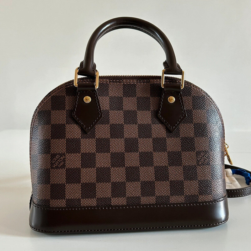 LOUIS VUITTON ALMA BB DAMIER EBENE FULL SET. AUTHENTIQUE SAC DE LUXE DE SECONDE MAIN CERTIFICAT D'AUTHENTICITE ENTRUPY. SAC D'OCCASION LV