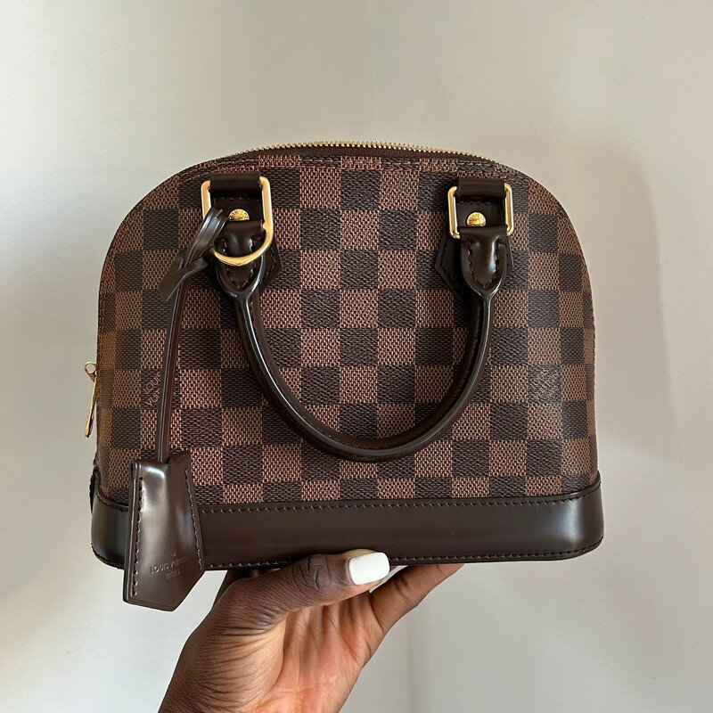LOUIS VUITTON ALMA BB DAMIER EBENE FULL SET. AUTHENTIQUE SAC DE LUXE DE SECONDE MAIN CERTIFICAT D'AUTHENTICITE ENTRUPY. SAC D'OCCASION LV