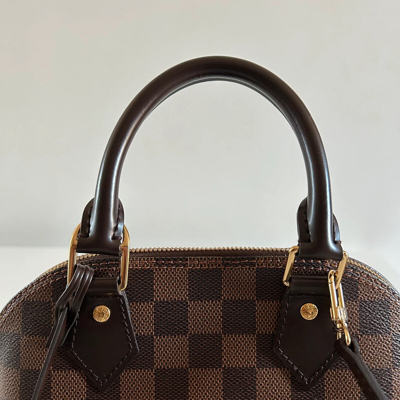 LOUIS VUITTON ALMA BB DAMIER EBENE FULL SET. AUTHENTIQUE SAC DE LUXE DE SECONDE MAIN CERTIFICAT D'AUTHENTICITE ENTRUPY. SAC D'OCCASION LV