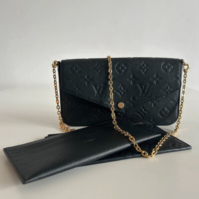 LOUIS VUITTON POCHETTE FELICIE EN CUIR MONOGRAM EMPREINTE NOIR. SAC DE LUXE D'OCCASION PAS CHER. LUXE DE SECONDE MAIN AUTHENTIQUE CERTIFICAT D'AUTHENTICITE ENTRUPY