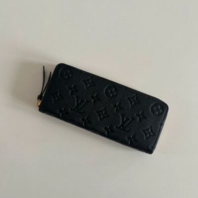 LOUIS VUITTON PORTEFEUILLE CLEMENCE EN CUIR MONOGRAM EMPREINTE NOIR NEUF FULL SET. SECONDE MAIN DE LUXE AUTHENTIQUE CERTIFICAT D'AUTHENTICITE ENTRUPY. PORTEFEUILLE LV D'OCCASION PAS CHER