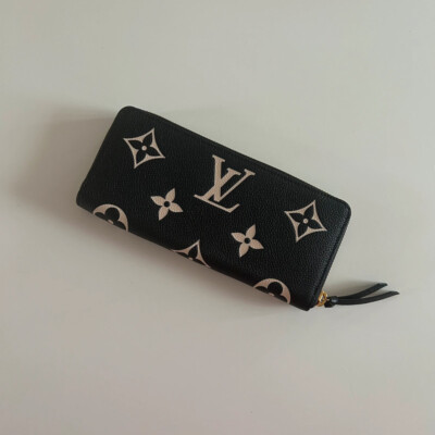 LOUIS VUITTON PORTEFEUILLE CLEMENCE EN CUIR MONOGRAM EMPREINTE BICOLORE NEUF FULL SET. SECONDE MAIN DE LUXE AUTHENTIQUE CERTIFICAT D'AUTHENTICITE ENTRUPY. PORTEFEUILLE LV D'OCCASION PAS CHER