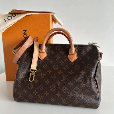 LOUIS VUITTON SPEEDY 30 BANDOULIERE MONOGRAM. SAC DE LUXE DE SECONDE MAIN AUTHENTIQUE CERTIFICAT D'AUTHENTICITE ENTRUPY. LUXE D'OCCASION PAS CHER