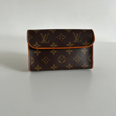 LOUIS VUITTON POCHETTE FLORENTINE EN TOILE MONOGRAM VINTAGE. LUXE DE SECONDE MAIN AUTHENTIQUE. SAC DE LUXE D'OCCASION AS CHER CERTIFICAT D'AUTHENTICITE ENTRUPY