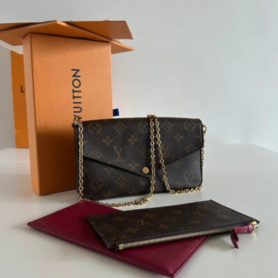 LOUIS VUITTON POCHETTE FELICIE EN TOILE MONOGRAM. SAC DE LUXE DE SECONDE MAIN AUTHENTIQUE. SAC DE LUXE D'OCCASION PAS CHER CERTIFICAT D'AUTHENTICITE ENTRUPY