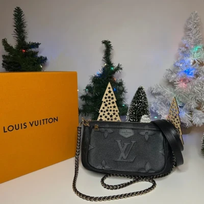 Louis Vuitton Multipochette accessoires en cuir monogram empreinte noir . Sac de luxe de seconde main authentique certificat d'authenticité entrupy. SAC DE LUXE D'OCCASION PAS CHER