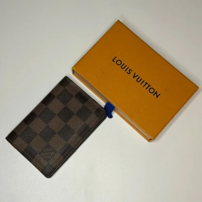 Organizer de poche damier ébène Louis Vuitton. Luxe de seconde main authentique.