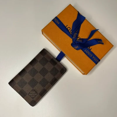 Organizer de poche damier ébène Louis Vuitton. Luxe de seconde main authentique.