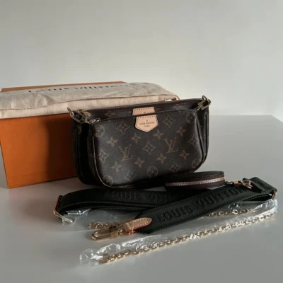 Louis Vuitton multipochette accessoires monogram . SAC DE LUXE DE SECONDE MAIN AUTHENTIQUE CERTIFICAT D'AUTHENTICITE ENTRUPY