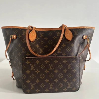 Louis Vuitton neverfull MM monogram Beige. Luxe de seconde main authentique certificat d'authenticité entrupy. sac de luxe d'occasion pas cher.