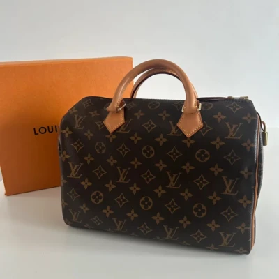 Louis Vuitton speedy 30 monogram toile monogram. Luxe de seconde main authentique. Certificat d'authenticité entrupy. Luxe d'occasion pas cher