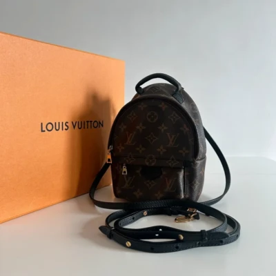 Louis Vuitton mini palm springs monogram. Sac de luxe de seconde main authentique. Sac d'occasion pas cher certificat d'authenticité entrupy