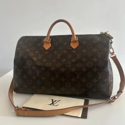 Louis Vuitton speedy 40 bandoulière monogram. SAC DE LUXE DE SECONDE MAIN AUTHENTIQUE CERTIFICAT D'AUTHENTICITE ENTRUPY. SAC DE LUXE D'OCCASION PAS CHER