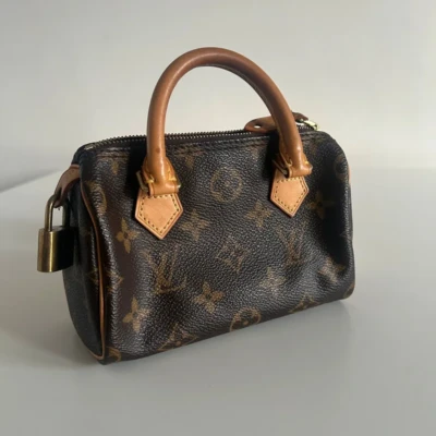 Louis Vuitton Louis Vuitton speedy nano monogram FULL ET. MINI HL LV. SAC DE LUXE DE SECONDE MAIN AUTHENTIQUE CERTIFICAT D'AUTHENTICITE ENTRUPY. SAC DE LUXE D'OCCASION PAS CHER