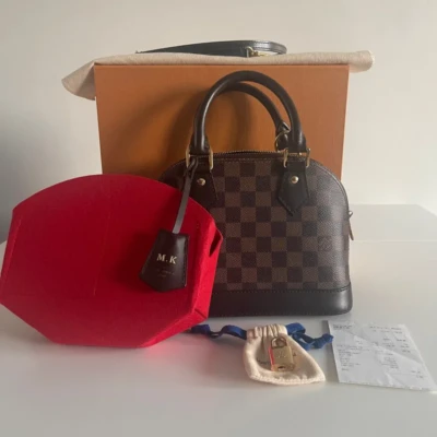 SAC DE LUXE DE SECONDE MAIN AUTHENTIQUE CERTIFICAT D'AUTHENTICITE ENTRUPY. SAC DE LUXE D'OCCASION PAS CHER.