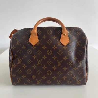 Speedy 30 Louis Vuitton 1 Le luxe en seconde main Sac Authentique Louis Vuitton Prix exceptionnel