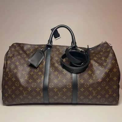 Louis Vuitton keepall bandoulière 55 monogram macassar. SAC DE LUXE DE SECONDE MAIN AUTHENTIQUE CERTIFICAT D'AUTHENTICITE ENTRUPY. SAC DE LUXE D'OCCASION PAS CHER. SAC DE VOYAGE DE LUXE