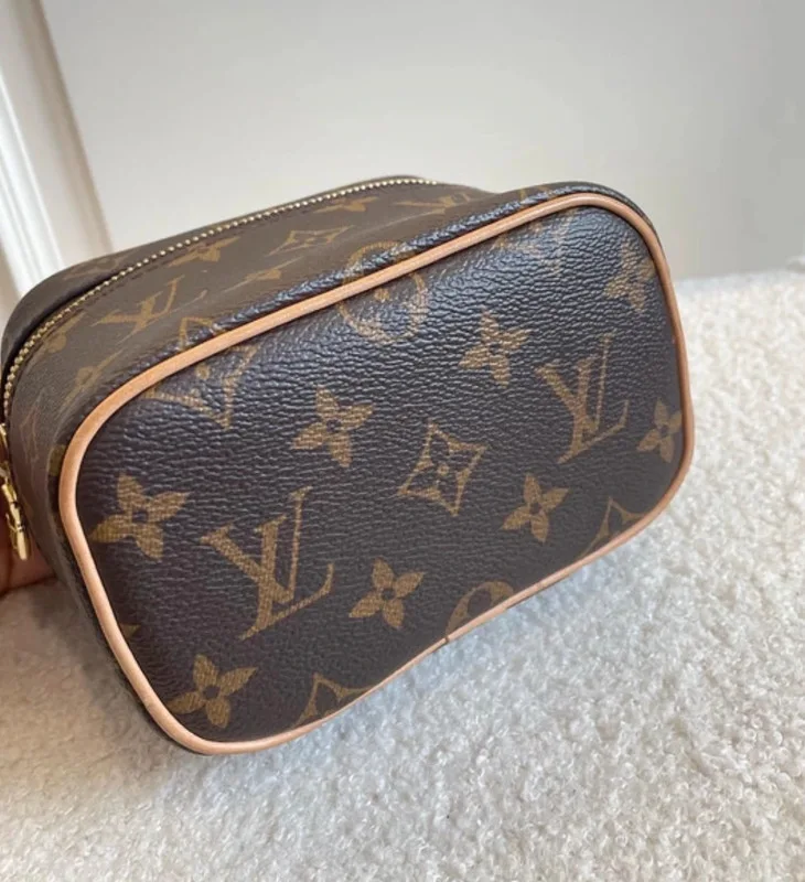 Louis Vuitton Nice nano en toile monogram. SAC DE LUXE DE SECONDE MAIN AUTHENTIQUE CERTIFICAT D'AUTHENTICITE ENTRUPY. SAC DE LUXE D'OCCASION PAS CHER.