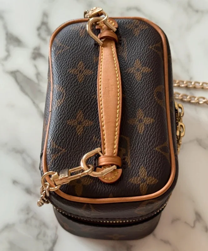 Louis Vuitton Nice nano en toile monogram. SAC DE LUXE DE SECONDE MAIN AUTHENTIQUE CERTIFICAT D'AUTHENTICITE ENTRUPY. SAC DE LUXE D'OCCASION PAS CHER.