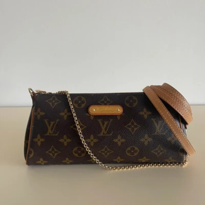 Louis Vuitton pochette Eva toile monogram sac de luxe de seconde main authentique. certificat d'authenticité entrupy