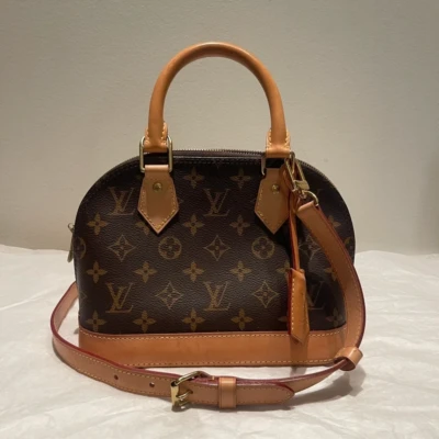 Louis Vuitton Alma BB monogram SAC DE LUXE DE SECONDE MAIN AUTHENTIQUE CERTIFICAT D'AUTHENTICITE ENTRUPY. SAC DE LUXE D'OCCASION PAS CHER.