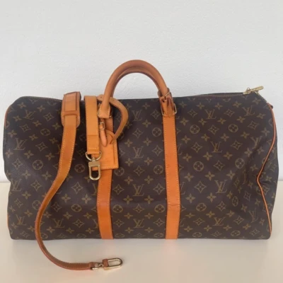 Louis Vuitton keepall 55 bandoulière vintage SAC DE LUXE DE SECONDE MAIN AUTHENTIQUE CERTIFICAT D'AUTHENTICITE ENTRUPY. SAC DE LUXE D'OCCASION PAS CHER.
