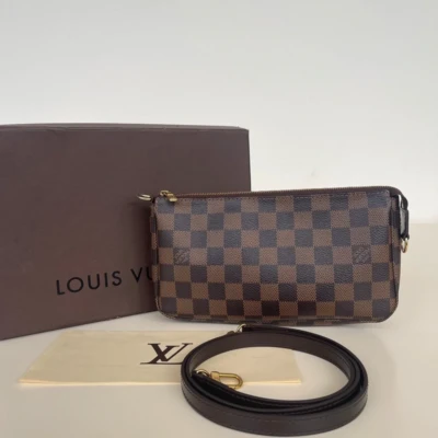 Louis Vuitton pochette accessoires NM damier ébène vintage SAC DE LUXE DE SECONDE MAIN AUTHENTIQUE. SAC VINTAGE; LV VINTAGE CERTIFICAT D'AUTHENTICITE ENTRUPY