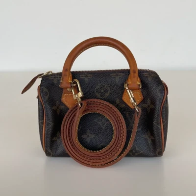 Louis Vuitton mini HL monogram vintage; Speedy nano LV. SAC DE LUXE DE SECONDE MAIN AUTHENTIQUE CERTIFICAT D'AUTHENTICITE ENTRUPY. SAC DE LUXE D'OCCASION PAS CHER.