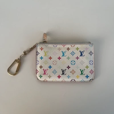 Louis Vuitton pochette-clés multicolore portefeuille DE LUXE DE SECONDE MAIN AUTHENTIQUE CERTIFICAT D'AUTHENTICITE ENTRUPY. SAC DE LUXE D'OCCASION PAS CHER. POCHETTE-clés takashi murakami multicolore