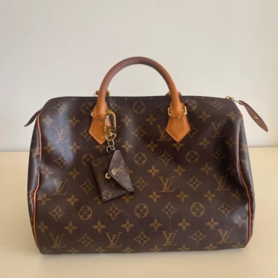 Louis Vuitton speedy 30 monogram SAC DE LUXE DE SECONDE MAIN AUTHENTIQUE CERTIFICAT D'AUTHENTICITE ENTRUPY. SAC DE LUXE D'OCCASION PAS CHER.