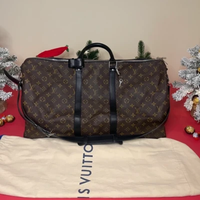 Louis Vuitton keepall bandoulière 55 monogram macassar. SAC DE LUXE DE SECONDE MAIN AUTHENTIQUE CERTIFICAT D'AUTHENTICITE ENTRUPY. SAC DE LUXE D'OCCASION PAS CHER. SAC DE VOYAGE DE LUXE
