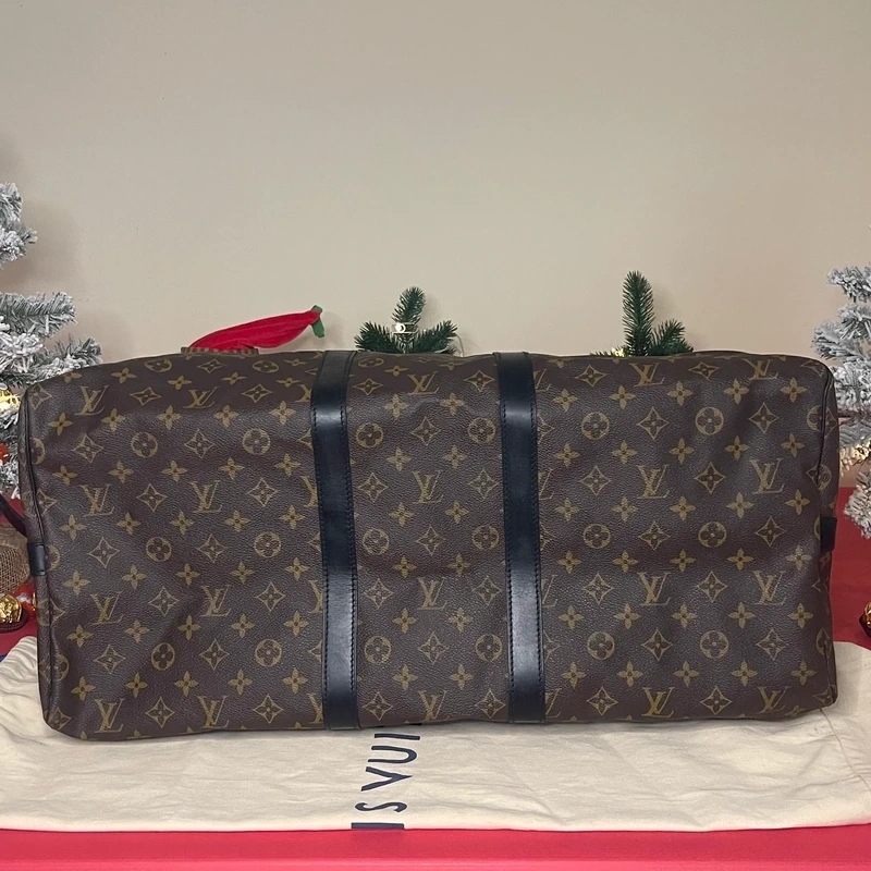 Louis Vuitton keepall bandoulière 55 monogram macassar. SAC DE LUXE DE SECONDE MAIN AUTHENTIQUE CERTIFICAT D'AUTHENTICITE ENTRUPY. SAC DE LUXE D'OCCASION PAS CHER. SAC DE VOYAGE DE LUXE