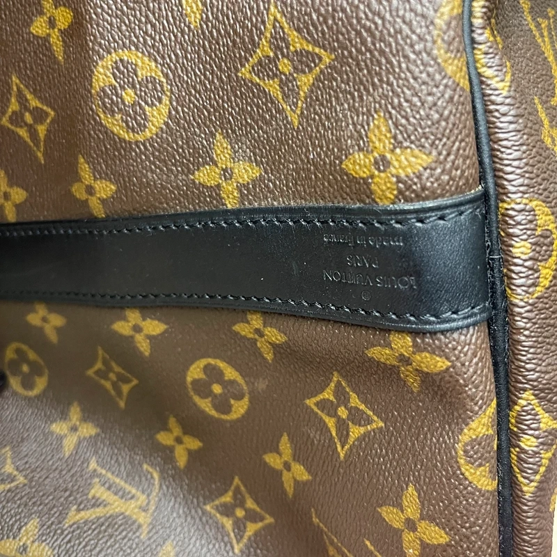 Louis Vuitton keepall bandoulière 55 monogram macassar. SAC DE LUXE DE SECONDE MAIN AUTHENTIQUE CERTIFICAT D'AUTHENTICITE ENTRUPY. SAC DE LUXE D'OCCASION PAS CHER. SAC DE VOYAGE DE LUXE
