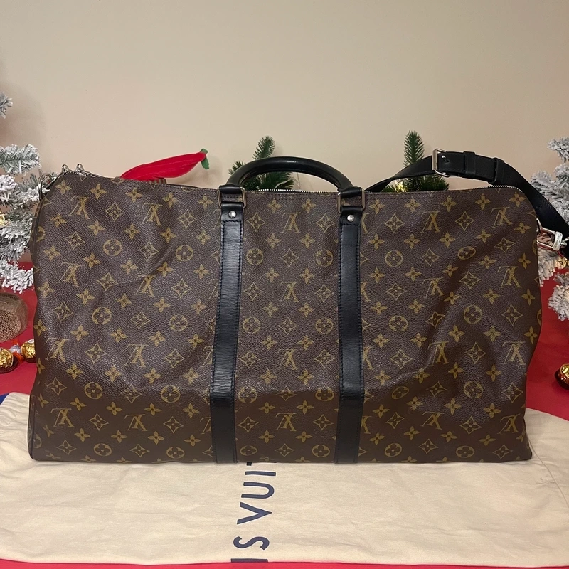 Louis Vuitton keepall bandoulière 55 monogram macassar. SAC DE LUXE DE SECONDE MAIN AUTHENTIQUE CERTIFICAT D'AUTHENTICITE ENTRUPY. SAC DE LUXE D'OCCASION PAS CHER. SAC DE VOYAGE DE LUXE