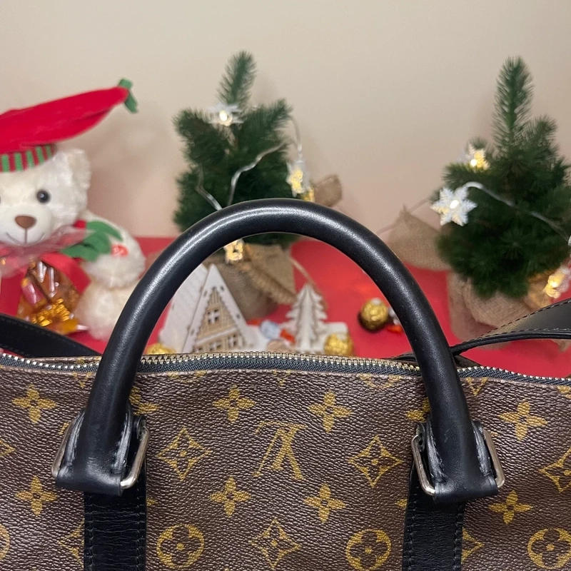 Louis Vuitton keepall bandoulière 55 monogram macassar. SAC DE LUXE DE SECONDE MAIN AUTHENTIQUE CERTIFICAT D'AUTHENTICITE ENTRUPY. SAC DE LUXE D'OCCASION PAS CHER. SAC DE VOYAGE DE LUXE