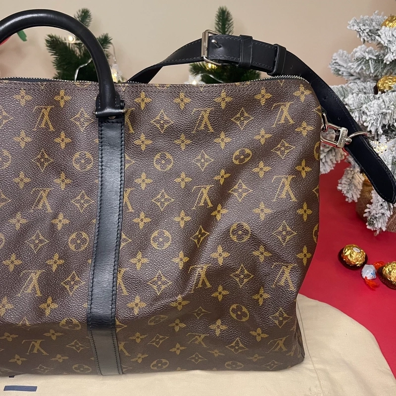 Louis Vuitton keepall bandoulière 55 monogram macassar. SAC DE LUXE DE SECONDE MAIN AUTHENTIQUE CERTIFICAT D'AUTHENTICITE ENTRUPY. SAC DE LUXE D'OCCASION PAS CHER. SAC DE VOYAGE DE LUXE