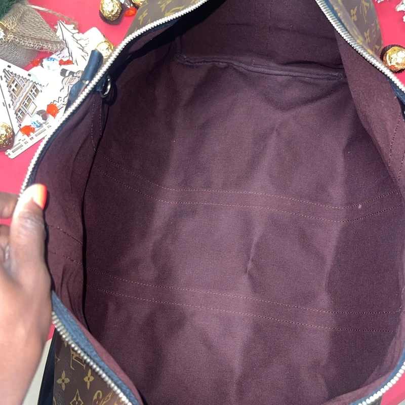 Louis Vuitton keepall bandoulière 55 monogram macassar. SAC DE LUXE DE SECONDE MAIN AUTHENTIQUE CERTIFICAT D'AUTHENTICITE ENTRUPY. SAC DE LUXE D'OCCASION PAS CHER. SAC DE VOYAGE DE LUXE