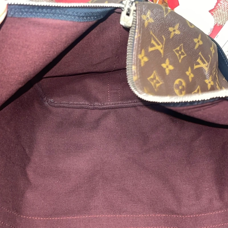 Louis Vuitton keepall bandoulière 55 monogram macassar. SAC DE LUXE DE SECONDE MAIN AUTHENTIQUE CERTIFICAT D'AUTHENTICITE ENTRUPY. SAC DE LUXE D'OCCASION PAS CHER. SAC DE VOYAGE DE LUXE