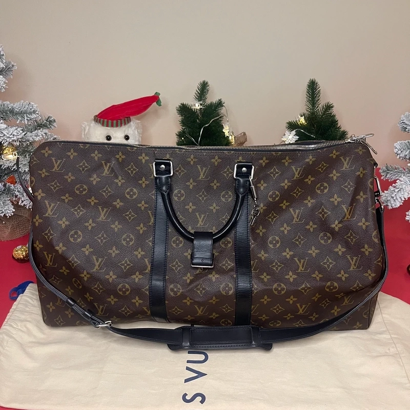 Louis Vuitton keepall bandoulière 55 monogram macassar. SAC DE LUXE DE SECONDE MAIN AUTHENTIQUE CERTIFICAT D'AUTHENTICITE ENTRUPY. SAC DE LUXE D'OCCASION PAS CHER. SAC DE VOYAGE DE LUXE