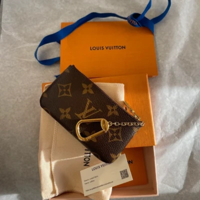Louis Vuitton pochette-clés monogram LUXE DE SECONDE MAIN AUTHENTIQUE CERTIFICAT D'AUTHENTICITE ENTRUPY. SAC DE LUXE D'OCCASION PAS CHER. LOUIS VUITTON FULL SET