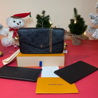 Louis Vuitton pochette Felicie en cuir empreinte noir SAC DE LUXE DE SECONDE MAIN AUTHENTIQUE CERTIFICAT D'AUTHENTICITE ENTRUPY. SAC DE LUXE D'OCCASION PAS CHER. LOUIS VUITTON FULL SET