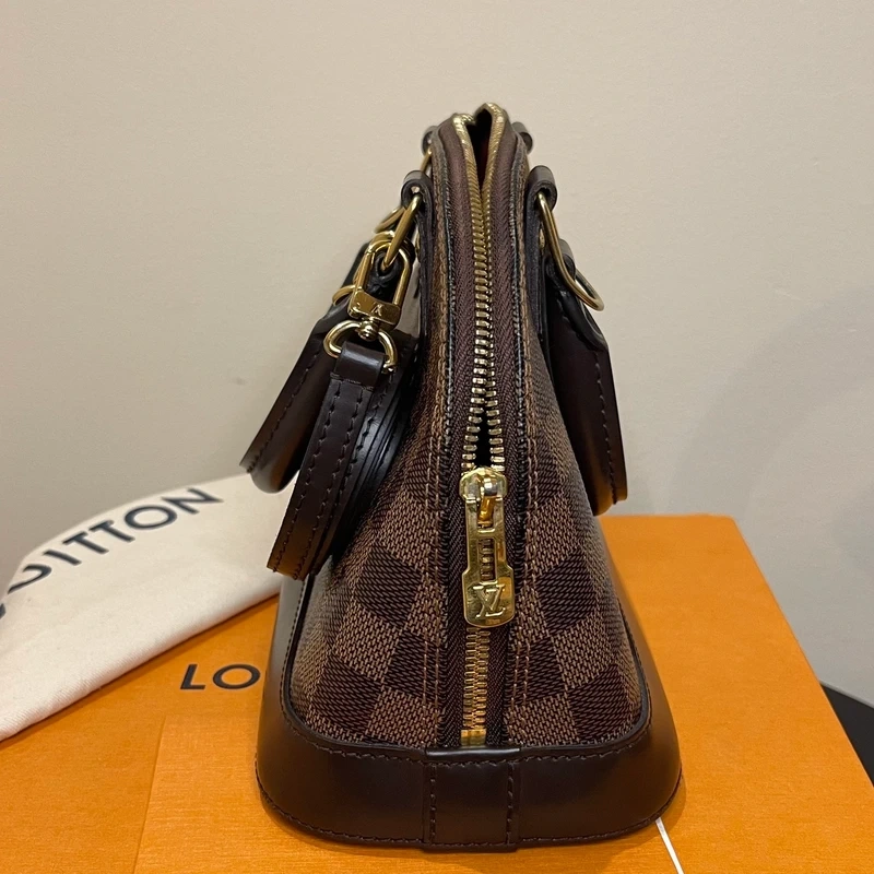 Louis Vuitton Alma BB authentique FULL SET SAC DE LUXE DE SECONDE MAIN AUTHENTIQUE CERTIFICAT D'AUTHENTICITE ENTRUPY. SAC DE LUXE D'OCCASION PAS CHER.