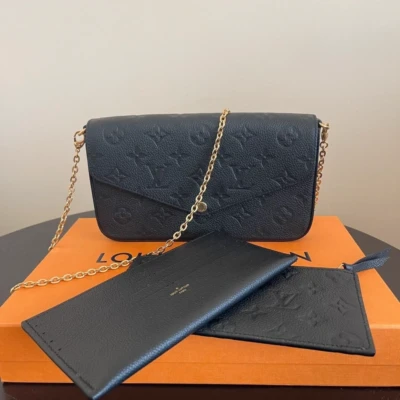 Louis Vuitton pochette Félicie en cuir monogram empreinte noir SAC DE LUXE DE SECONDE MAIN AUTHENTIQUE CERTIFICAT D'AUTHENTICITE ENTRUPY. SAC DE LUXE D'OCCASION PAS CHER. LOUIS VUITTON FULL SET