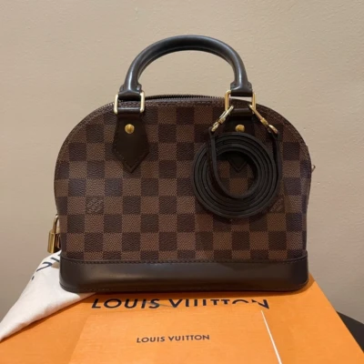Louis Vuitton Alma BB authentique FULL SET SAC DE LUXE DE SECONDE MAIN AUTHENTIQUE CERTIFICAT D'AUTHENTICITE ENTRUPY. SAC DE LUXE D'OCCASION PAS CHER.