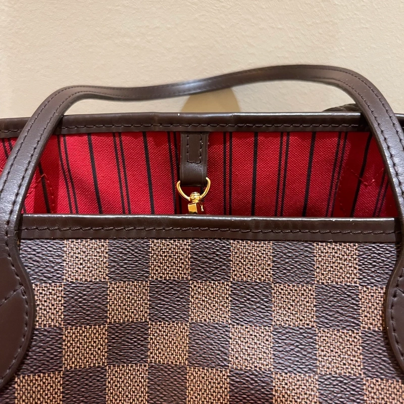 LOUIS VUITTON neverfull MM damier ébène LUXE DE SECONDE MAIN AUTHENTIQUE CERTIFICAT D'AUTHENTICITE ENTRUPY. SAC DE LUXE D'OCCASION PAS CHER LOUIS VUITTON FULL SET