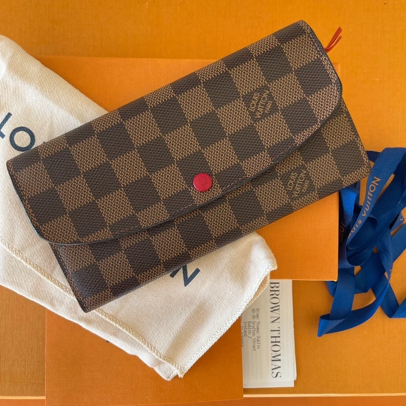 LOUIS VUITTON portefeuille Emilie damier ébène LUXE DE SECONDE MAIN AUTHENTIQUE CERTIFICAT D'AUTHENTICITE ENTRUPY. PORTEFEUILLE DE LUXE D'OCCASION PAS CHER