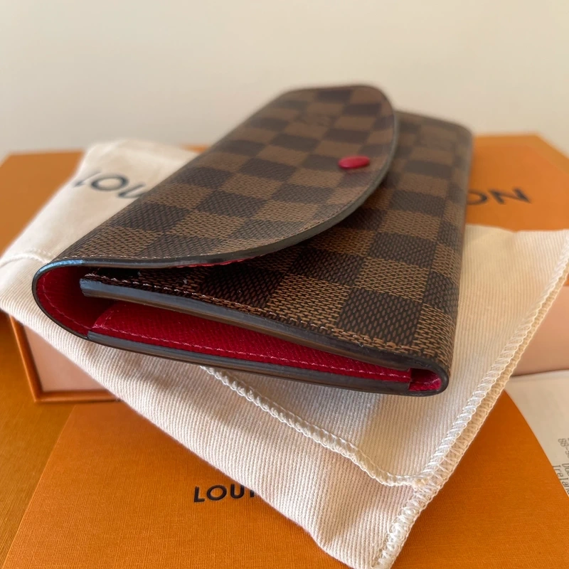 LOUIS VUITTON portefeuille Emilie damier ébène LUXE DE SECONDE MAIN AUTHENTIQUE CERTIFICAT D'AUTHENTICITE ENTRUPY. PORTEFEUILLE DE LUXE D'OCCASION PAS CHER