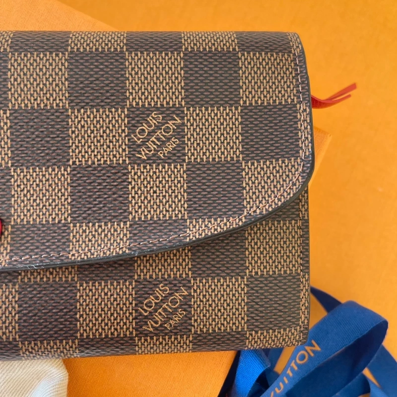 LOUIS VUITTON portefeuille Emilie damier ébène LUXE DE SECONDE MAIN AUTHENTIQUE CERTIFICAT D'AUTHENTICITE ENTRUPY. PORTEFEUILLE DE LUXE D'OCCASION PAS CHER